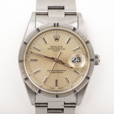 an image of a watch that is sitting on a white surface