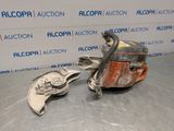 a close up of a chainsaw and a wren on a table