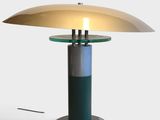 a close up of a lamp on a table with a white background