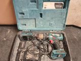 a tool in a case that is sitting on the floor