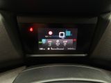 a digital display in the center of a car