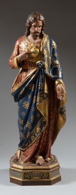 une image représentant une statue de Jésus tenant un enfant dans ses bras