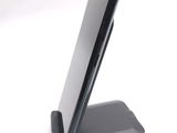 a cell phone that is sitting on top of a stand