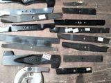 a lot of different types of blades on the table