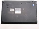 a black laptop with a small battery on top of it