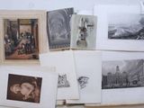 a lot of old photographs on the table