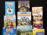 a lot of children ' s dvds on a black background