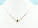 a gold star necklace on a mannequin mannequin mannequin mannequin mannequin mannequin mannequin mannequin manne