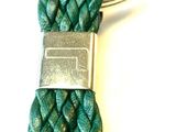 a close up of a key chain on a white background