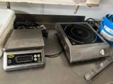 a stove and a blender on a counter in a kitchen