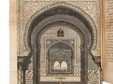 un livre ouvert dans lequel figure l'image d'un bâtiment