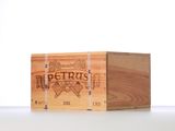 a wooden box with a label on it on a table