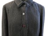 a close up of a jacket on a mannequin mannequin