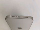 the back of a silver iphone with a small screen on top of it