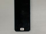 an iphone is shown on a white surface with a number on it