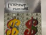 a close up of a box of money with a dollar sign on it