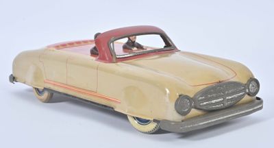 a toy car that is sitting on a white surface