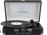 une image représentant une valise contenant un tourne-disque
