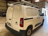 a white van that is parked in a garage