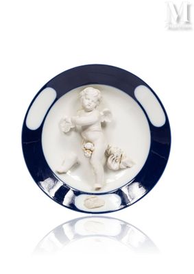 a plate with a picture of a child on it