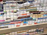 many books in the cage on the shelf