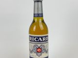 a bottle of beer that is sitting on a table