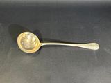 a spoon that is sitting on top of a table