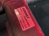 a close up of a red object on a table