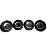 four black lens lenses are lined up in a row on a white background