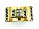 an image of a diamond and ruby ring on a white background