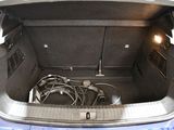 a trunk of a car with a bunch of wires in it