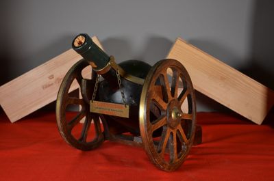 a wooden cart with a wine bottle on top of it