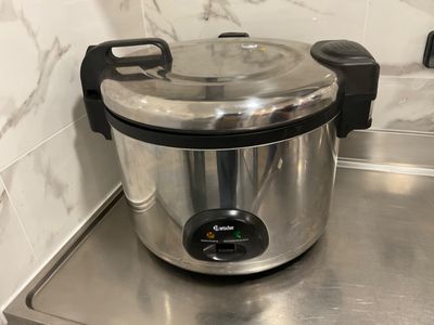 stainless steel counter top with a stainless steel pot on top of it