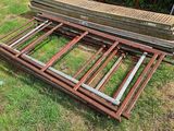 a pile of wood and metal on the ground