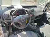 a dashboard of a car with a steering wheel and dashboard controls