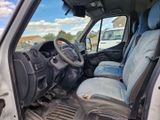 a picture of the inside of a truck with the driver ' s seat up
