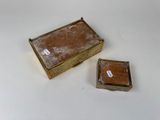 a small box and a small box on a table