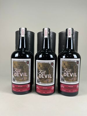 trois bouteilles de vin du diable posées sur une table