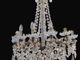 an image of a crystal chandelier hanging from a ceiling