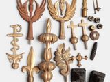 many different types of decorative objects displayed on a white surface