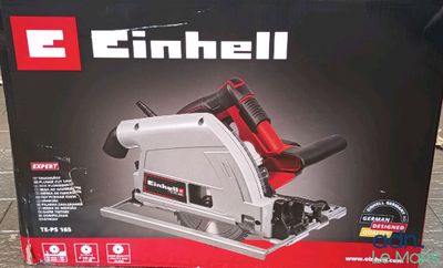 the box is open to show the contents of a circular cutter