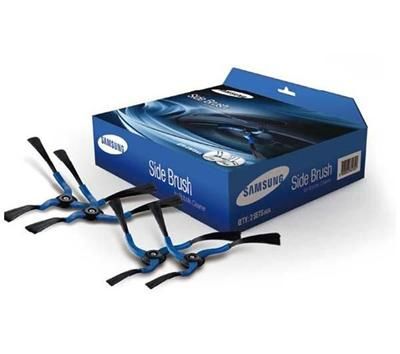 three pairs of scissors in a blue box on a white surface