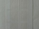 a picture of a piece of paper with stitching on it