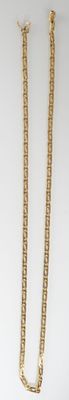 gold plated necklace and earrings on a white background