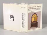 a book with a picture of an old clock inside of it