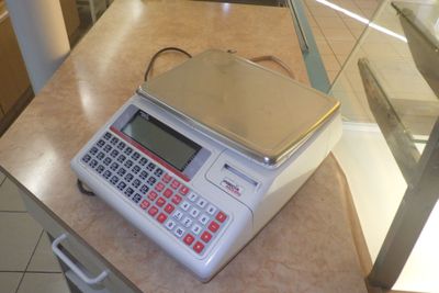 a scale that is sitting on a counter in a store