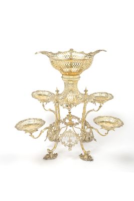 a gold plated candle holder on a white background