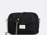 a black cross body bag with a chain strap and a name tag on the front