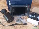 a box with a camera and a monitor on it