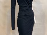 a black dress with long sleeves on a mannequin mannequin mannequin mannequin mann